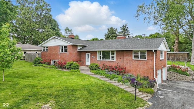 4614 Thornleigh Dr, Indianapolis, IN 46226 - tri-level home with brick siding, a chimney, driveway, and a shingled roof