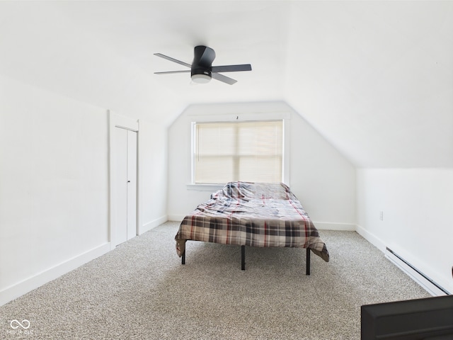 201 N 11th St, Elwood, IN 46036 - bedroom with baseboard heating, carpet floors, lofted ceiling, baseboards, and a ceiling fan