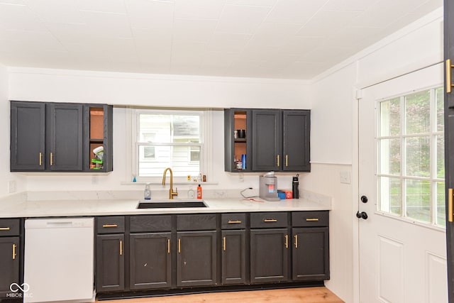 201 N 11th St, Elwood, IN 46036 - kitchen with dishwasher, a sink, crown molding, and light wood-style flooring