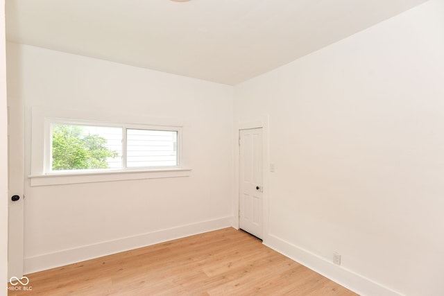 201 N 11th St, Elwood, IN 46036 - empty room featuring baseboards and light wood-style flooring