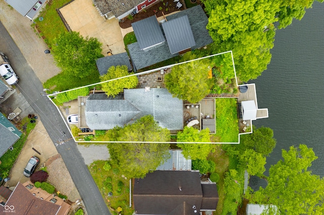 242 W Warford Dr, Princes Lakes, IN 46164 - aerial view of property and surrounding area featuring a nearby body of water and property parcel outlined