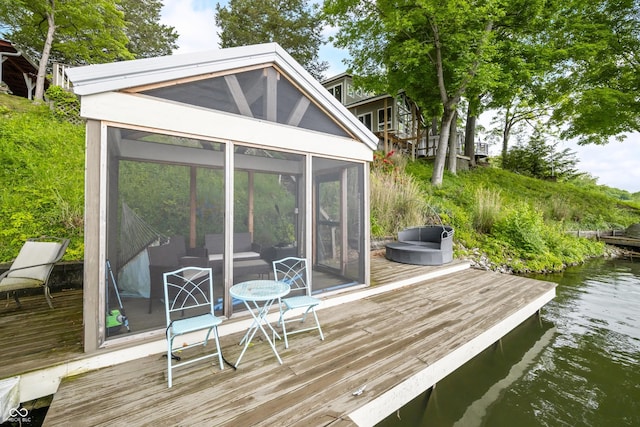 242 W Warford Dr, Princes Lakes, IN 46164 - deck with a sunroom and a water view