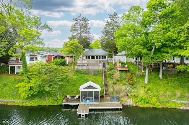 242 W Warford Dr, Princes Lakes, IN 46164 - back of house with a deck with water view