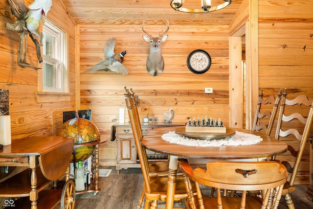 242 W Warford Dr, Princes Lakes, IN 46164 - dining area with wood walls and dark wood-type flooring