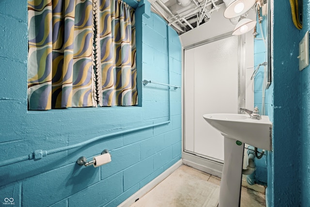 242 W Warford Dr, Princes Lakes, IN 46164 - full bathroom featuring concrete block wall and a shower with curtain