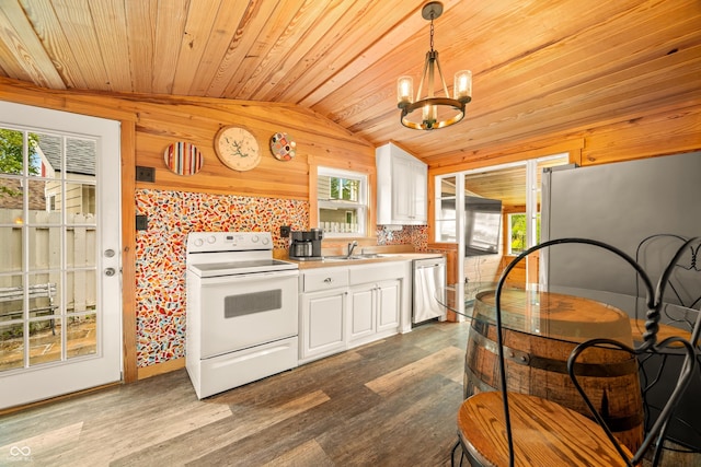 242 W Warford Dr, Princes Lakes, IN 46164 - kitchen with stainless steel appliances, lofted ceiling, wood ceiling, a sink, and dark wood-type flooring