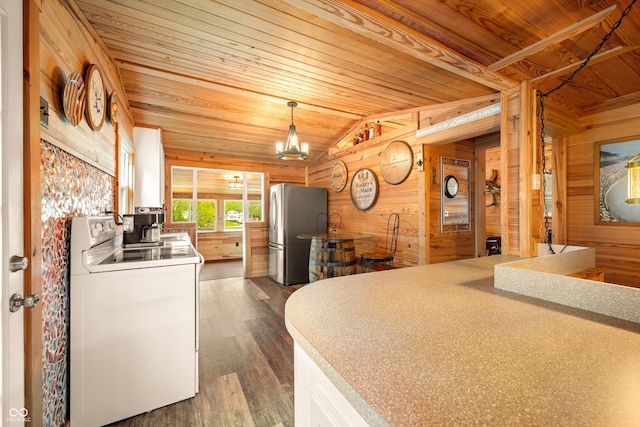 242 W Warford Dr, Princes Lakes, IN 46164 - kitchen with freestanding refrigerator, white range with electric cooktop, wooden ceiling, wood walls, and a chandelier