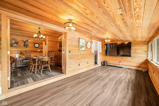 242 W Warford Dr, Princes Lakes, IN 46164 - dining space featuring wood finished floors, wooden walls, a chandelier, and wooden ceiling