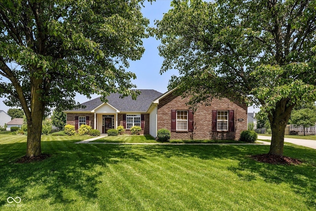 1854 Oconnor Ct, Avon, IN 46123 - view of front facade with brick siding, a front yard, and roof with shingles