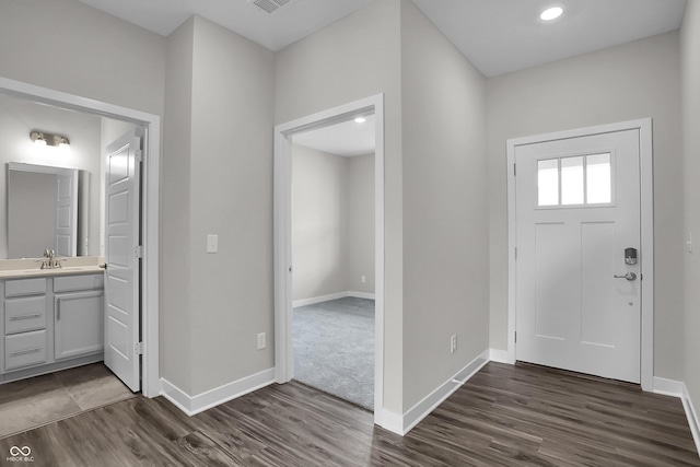 633 Bridgeman Rd, Avon, IN 46123 - foyer entrance featuring dark wood-style flooring and baseboards