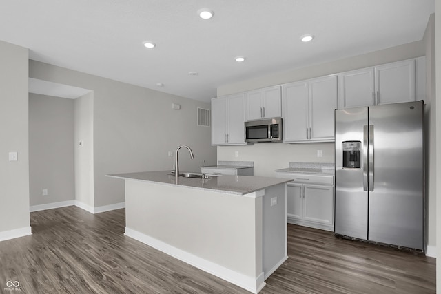 633 Bridgeman Rd, Avon, IN 46123 - kitchen with appliances with stainless steel finishes, a sink, dark wood-style floors, white cabinetry, and recessed lighting
