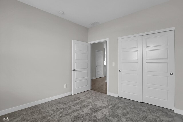 633 Bridgeman Rd, Avon, IN 46123 - unfurnished bedroom featuring carpet, baseboards, and a closet