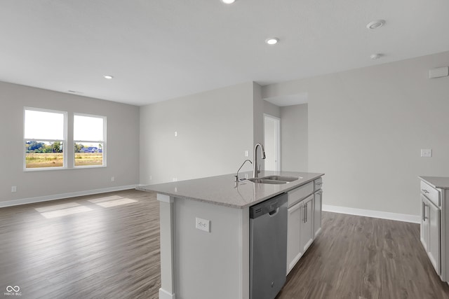 633 Bridgeman Rd, Avon, IN 46123 - kitchen with dishwasher, a sink, dark wood finished floors, baseboards, and a kitchen island with sink
