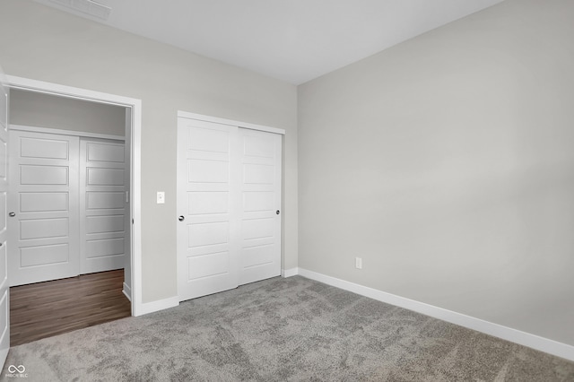 633 Bridgeman Rd, Avon, IN 46123 - unfurnished bedroom with carpet, baseboards, and a closet