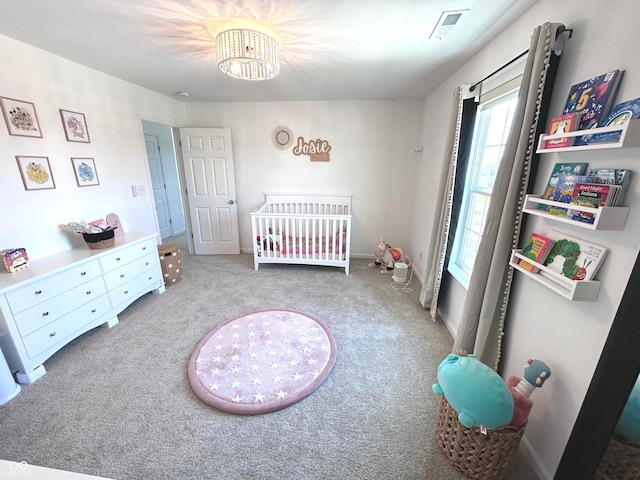 1056 Bent Branch Ln, Greenwood, IN 46143 - bedroom with carpet, a chandelier, and a nursery area