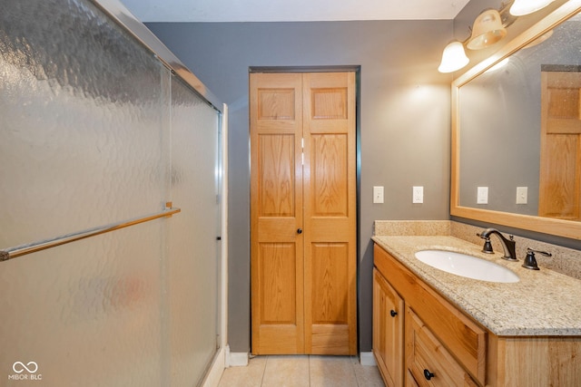 2544 N E Raintree Dr, New Castle, IN 47362 - full bath with a shower stall, vanity, and tile patterned floors