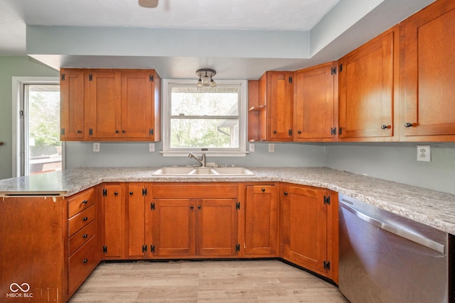 2544 N E Raintree Dr, New Castle, IN 47362 - kitchen featuring stainless steel dishwasher, light countertops, a peninsula, and healthy amount of natural light