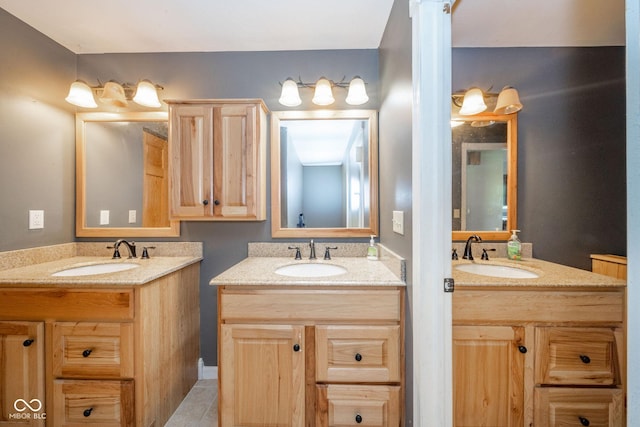 2544 N E Raintree Dr, New Castle, IN 47362 - bathroom with two vanities and tile patterned floors