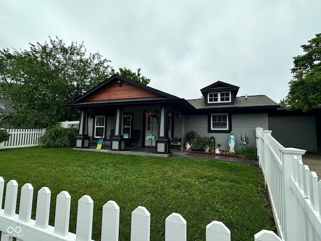 9527 Pepperidge Dr, Indianapolis, IN 46235 - view of front of house featuring a garage, covered porch, and driveway