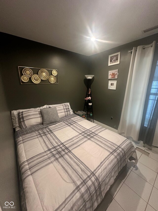 9527 Pepperidge Dr, Indianapolis, IN 46235 - bedroom with light tile patterned floors
