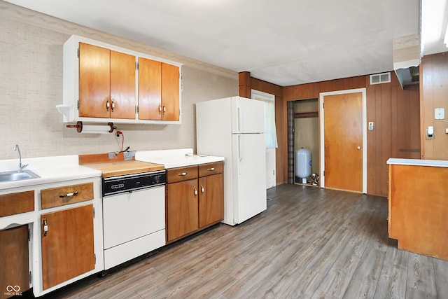 6580 N US Highway 31, Whiteland, IN 46184 - kitchen featuring white appliances, light countertops, light wood-type flooring, a sink, and brown cabinetry