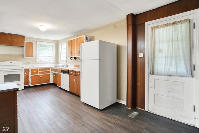 6580 N US Highway 31, Whiteland, IN 46184 - kitchen featuring white appliances, dark wood-style floors, a sink, and brown cabinetry