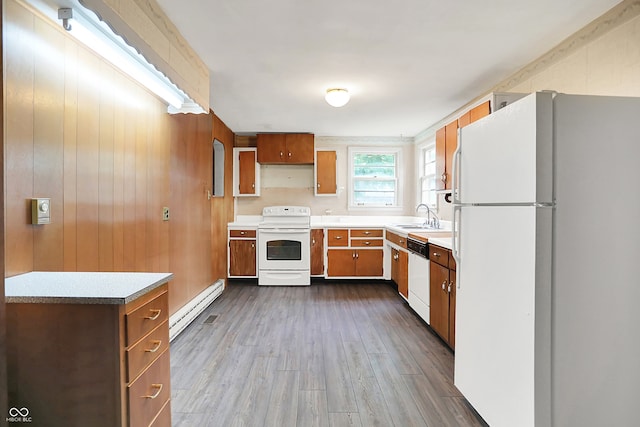6580 N US Highway 31, Whiteland, IN 46184 - kitchen with white appliances, baseboard heating, a sink, dark wood-style floors, and brown cabinetry
