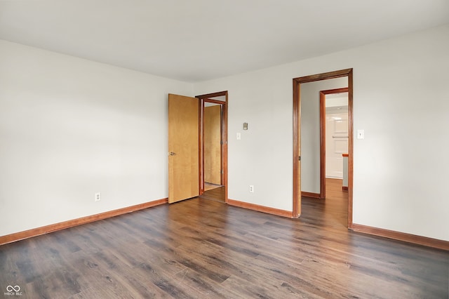 6580 N US Highway 31, Whiteland, IN 46184 - empty room with dark wood-style floors and baseboards