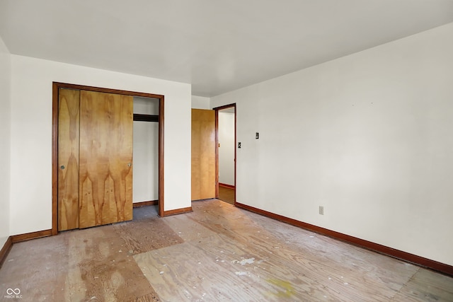 6580 N US Highway 31, Whiteland, IN 46184 - unfurnished bedroom featuring baseboards and a closet
