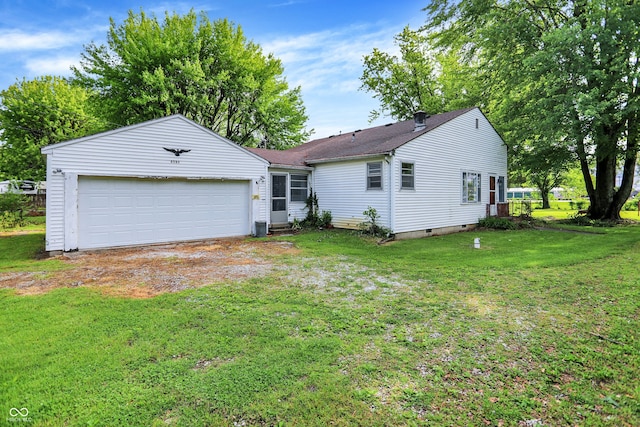 6580 N US Highway 31, Whiteland, IN 46184 - rear view of house featuring a garage, a lawn, driveway, and roof with shingles