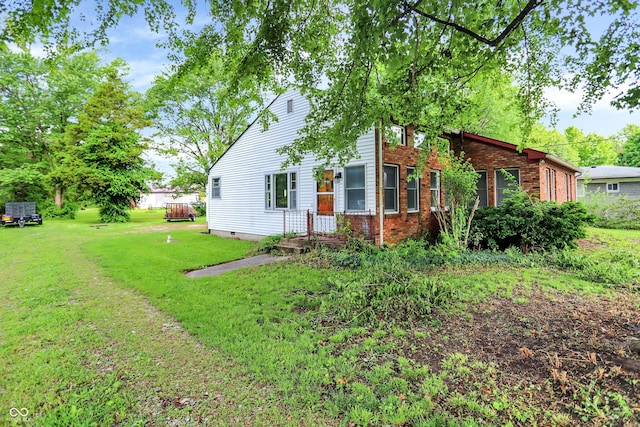 6580 N US Highway 31, Whiteland, IN 46184 - view of home's exterior featuring a yard