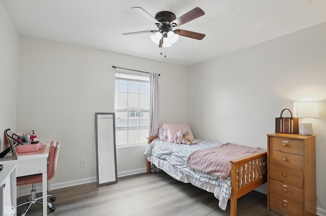 9771 Blue Violet Dr, Noblesville, IN 46060 - bedroom featuring wood finished floors, baseboards, an office area, and ceiling fan