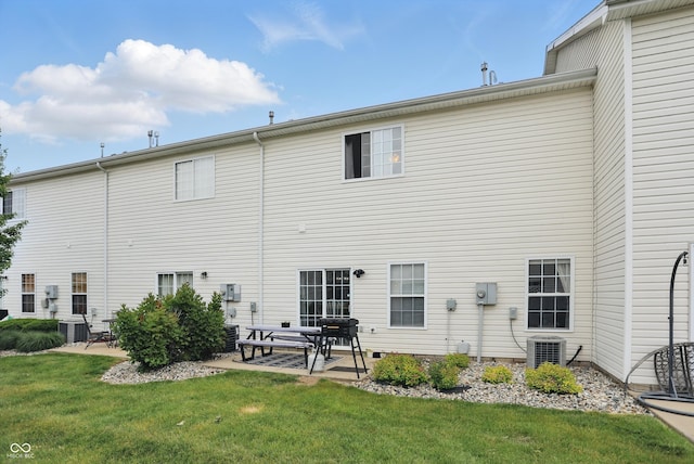 9771 Blue Violet Dr, Noblesville, IN 46060 - back of house with a patio area, a lawn, and central AC unit