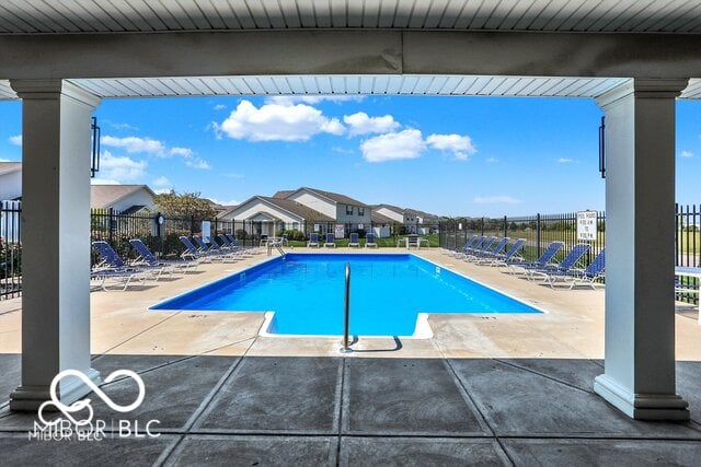 9771 Blue Violet Dr, Noblesville, IN 46060 - community pool featuring a patio area and a residential view