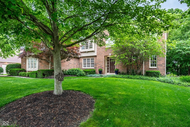 14274 Matt St, Carmel, IN 46033 - view of front of home featuring brick siding and a front yard