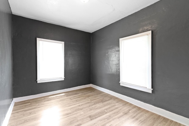 3636 Crescent Ave, Indianapolis, IN 46208 - empty room with wood finished floors and baseboards