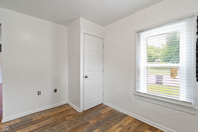 3636 Crescent Ave, Indianapolis, IN 46208 - unfurnished room with wood finished floors, plenty of natural light, and baseboards