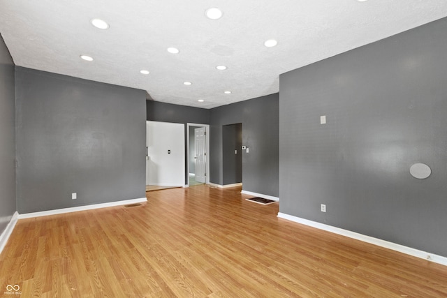 3636 Crescent Ave, Indianapolis, IN 46208 - spare room with light wood-style floors, recessed lighting, and baseboards