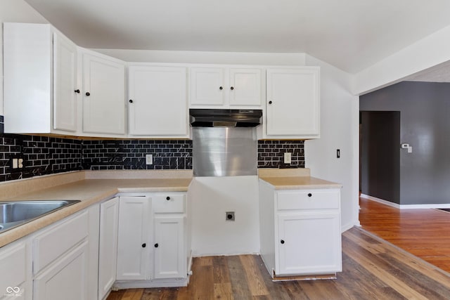 3636 Crescent Ave, Indianapolis, IN 46208 - kitchen with white cabinetry, dark wood finished floors, light countertops, and tasteful backsplash