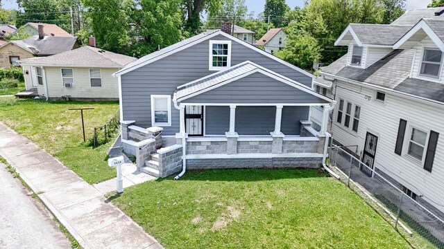 3636 Crescent Ave, Indianapolis, IN 46208 - back of house featuring a porch