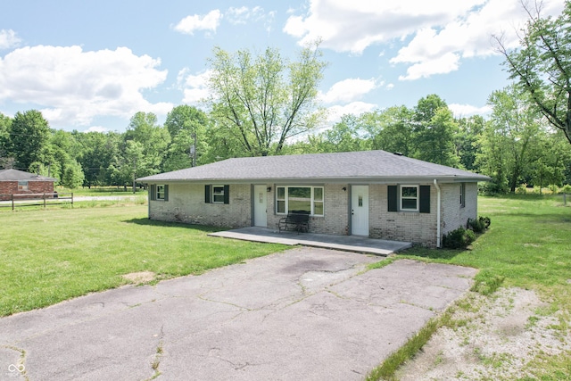 1440 N County Road 275 E, North Vernon, IN 47265 - single story home featuring covered porch, brick siding, and a front lawn