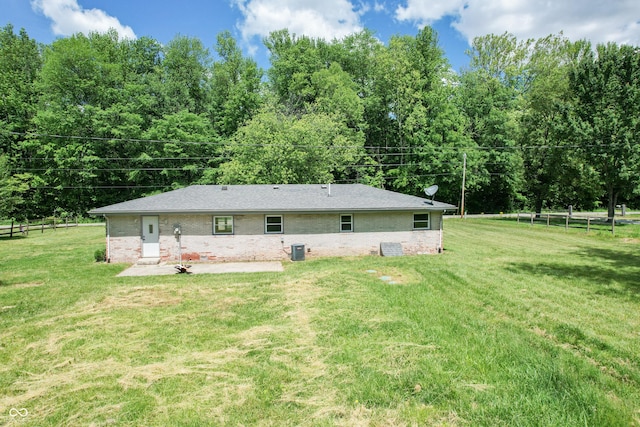 1440 N County Road 275 E, North Vernon, IN 47265 - rear view of property featuring a patio area and brick siding