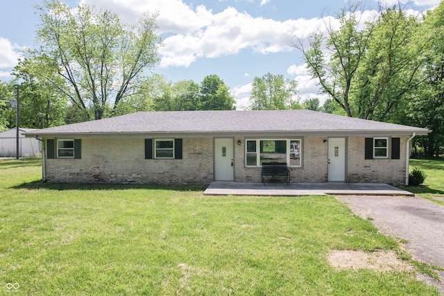 1440 N County Road 275 E, North Vernon, IN 47265 - single story home featuring a porch, brick siding, and a front lawn