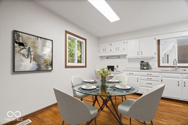 11123 Haverstick Rd, Carmel, IN 46033 - dining area with wood finished floors and baseboards