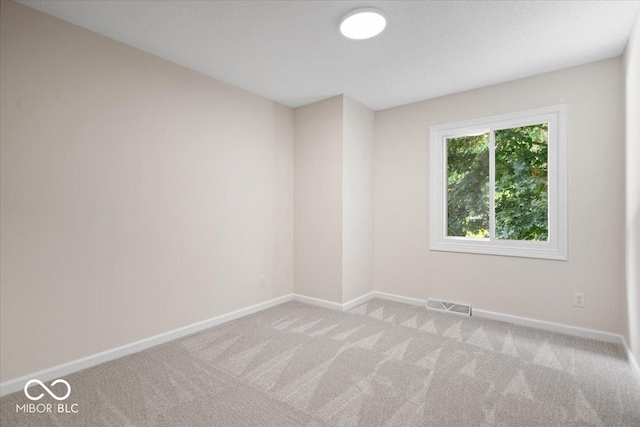 11123 Haverstick Rd, Carmel, IN 46033 - spare room featuring carpet and baseboards