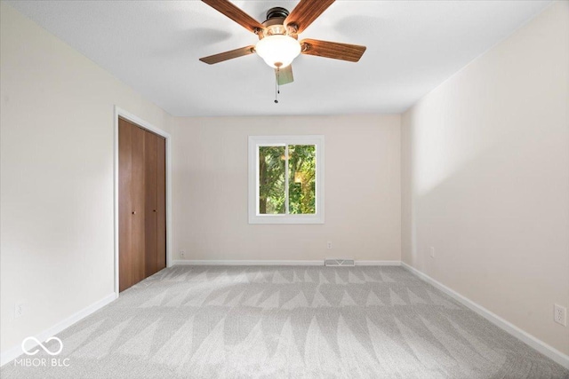 11123 Haverstick Rd, Carmel, IN 46033 - unfurnished bedroom with light carpet, baseboards, and a closet