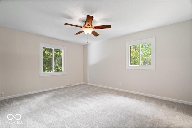 11123 Haverstick Rd, Carmel, IN 46033 - unfurnished room with plenty of natural light, light carpet, and baseboards