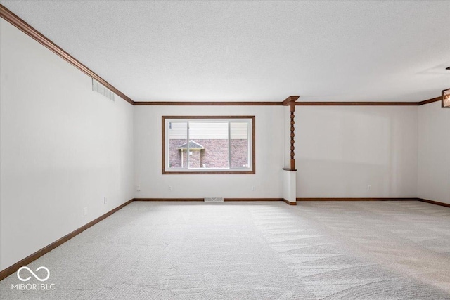 11123 Haverstick Rd, Carmel, IN 46033 - empty room featuring carpet floors, ornamental molding, baseboards, and a textured ceiling