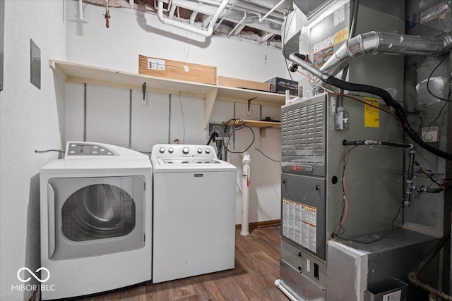 11123 Haverstick Rd, Carmel, IN 46033 - washroom featuring independent washer and dryer, wood finished floors, and heating unit
