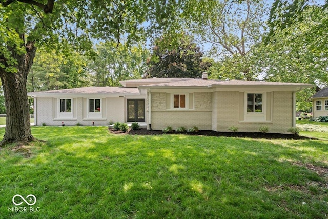 11123 Haverstick Rd, Carmel, IN 46033 - view of front of house with a front yard and brick siding